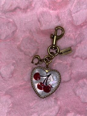 coach vintage cherry heart charm